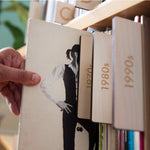 Wood record dividers to organize vinyl records by decade
