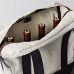 The Record Tote can hold 4 bottles of wine with our signature wood base to support heavy loads