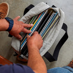 The Record Tote has a capacity of over 15 records. Made with Cone denim and a wood base inside