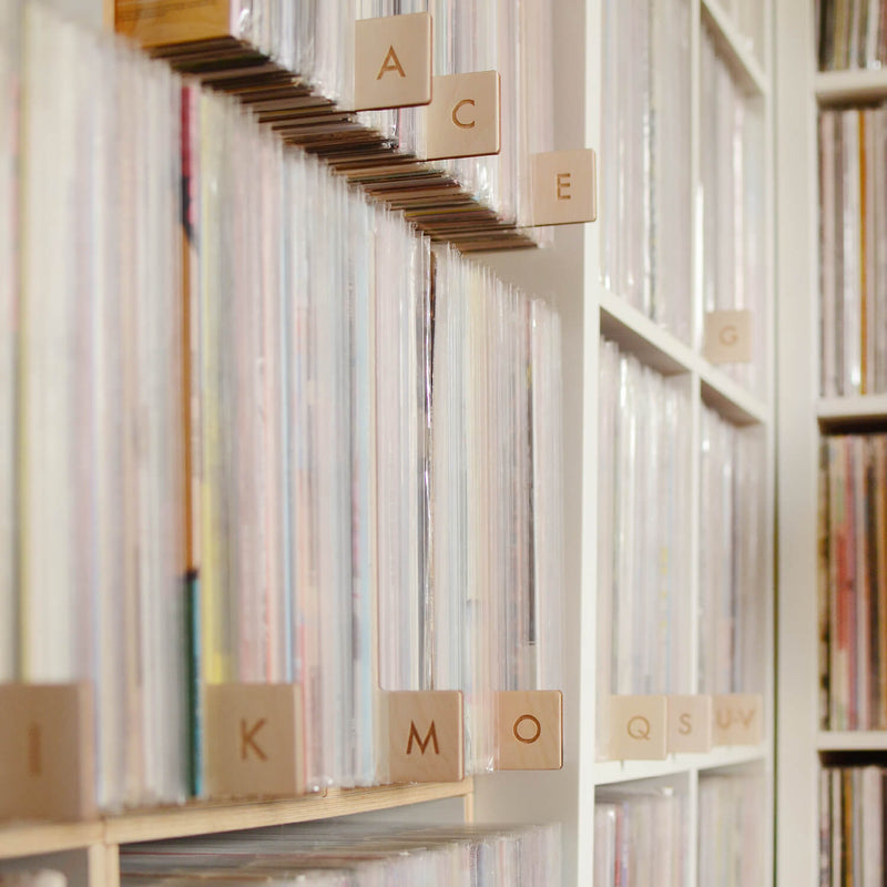 Full set of alphabetical wood record dividers in vinyl collection